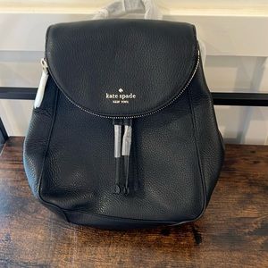 Small Kate spade black leather backpack/purse. Brand new. Never used.